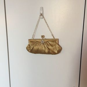 gold purse with optional cross body chain